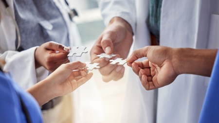 Doctors standing in a circle