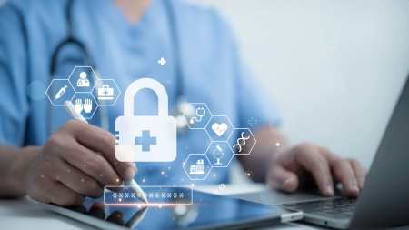 Doctor on the computer with a lock symbol